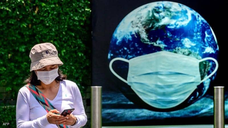 الصحة العالمية | تدعو المطعّمين ضد كورونا للالتزام بالكمامات