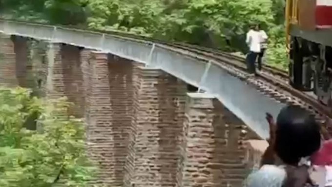 مغامرة خطيرة لزوجين تنتهى بقفزهما من ارتفاع 90 قدما أثناء جلسة تصوير