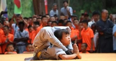 طفلة صينية 9 سنوات تبهر الجمهور فى دورة ألعاب عالمية للكونغ فو